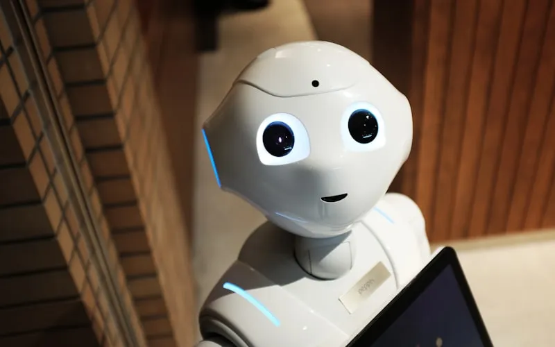 Student working on an artificial intelligence and machine learning project on a laptop